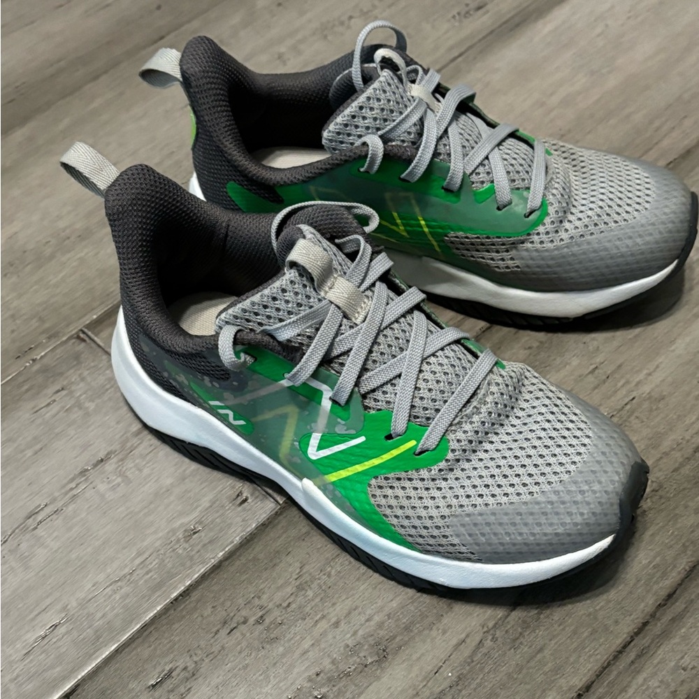 Little kid’s grey & green New Balance shoes